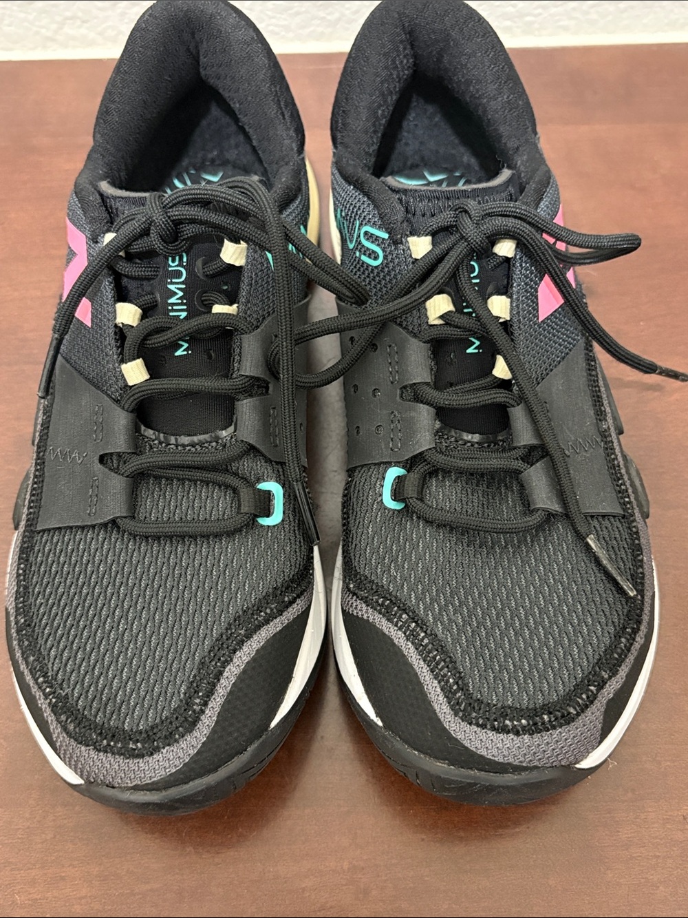 New Balance Minimus Black running shoes with Pink and Teal Accents